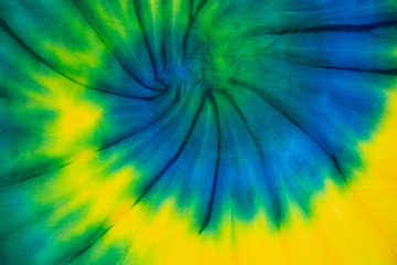 Tie Dye spiral swirl abstract texture and background , reggae style .