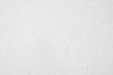 Neutral white colored low contrast Concrete textured background with roughness and irregularities to your concept or product.