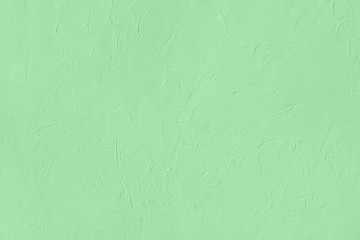 Obraz premium Trendy mint colored low contrast Concrete textured background with roughness and irregularities to your design or product. Year color trend concept.