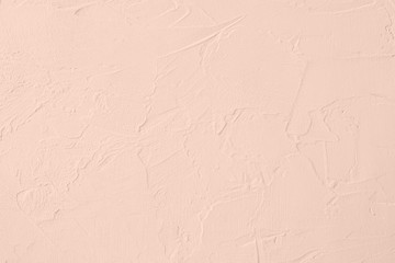 Pale pink colored low contrast Concrete textured background with roughness and irregularities. Autumn Winter 2020 color trend.