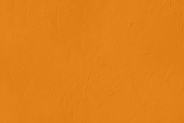 Saturated dark yellow colored low contrast Concrete textured background with roughness and irregularities. Autumn Winter 2020 color trend.