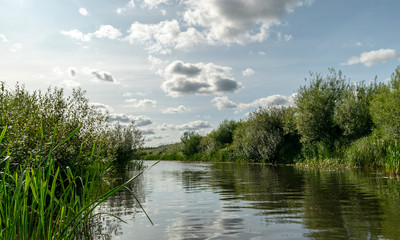 Landscape with Seda River, which flows into Burtnieki Lake. Beautiful sunny summer day, Latvia