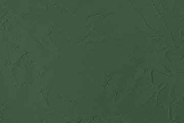Dark green Concrete textured background to your concept or product. Winter 2020 color trend