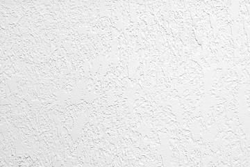 Neutral white colored low contrast Concrete textured background with roughness and irregularities...