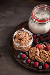 Top view of healthy and delicious chocolate biscuits with fresh bluebarries