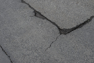 Fototapeta na wymiar Asphalt road crack patch damage