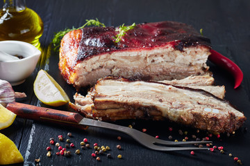 close-up of roasted sliced jerk pork belly