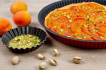 apricot pie just baked on wooden background