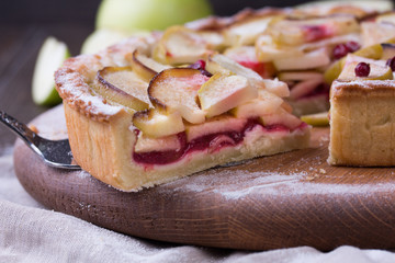 Homemade Apple Pie on rustic background. Classic autumn Thanksgiving dessert.