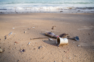 Closeup Many pieces of waste on the Beach