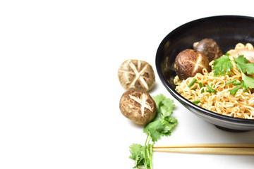 Delicious noodles with shiitake mushrooms, pork belly on a white background, Asian food