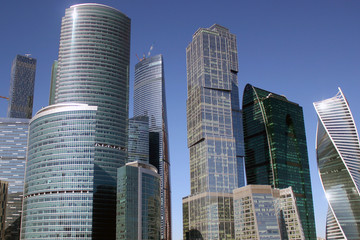 Fototapeta na wymiar Several modern tall glass buildings in Moscow city