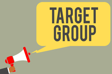 Conceptual hand writing showing Target Group. Business photo text Particular people that an advertisement intended to reach to Man holding megaphone loudspeaker speech bubble message speaking