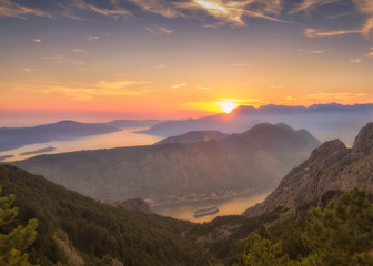 Kotor bay seen from above in a beautiful sunset summer day. Tourist liners on the pier. Montenegro. Bay of Kotor (Gulf of Kotor, Boka Kotorska) Montenegro