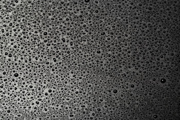 abstract water drops on a dark black  background