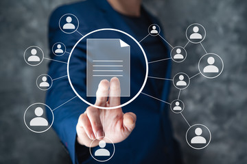 man touching file in screen