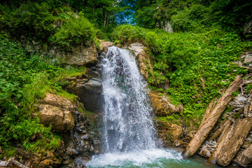 Park of waterfalls Mendeliha. Forest river and waterfall. Sochi. Rosa Khutor