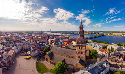 Beautifull aerial panoramic view from drone In sunny summer Day to histirical center Riga and quay...