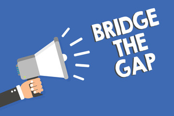 Text sign showing Bridge The Gap. Conceptual photo Overcome the obstacles Challenge Courage Empowerment Man holding megaphone loudspeaker blue background message speaking loud