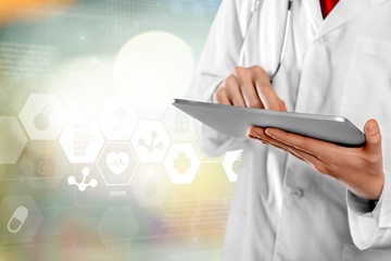 Close-up Doctor at hospital working with tablet pc
