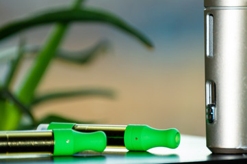 A vape kit including cannabis oil cartridges and personal rechargeable vaping device.