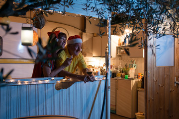 Mature couple enjoying on new years evening in their beach house