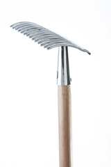 Steel rake on a white background