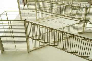 metal fire escape from reinforcement on the building, bottom view