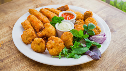 Vegetable veg tempura platter  -  deep fried sweet potato, mushrooms, cauliflower, served with...