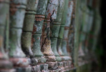 old cracked columns in an abandoned building