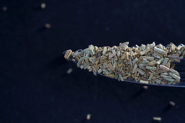 Spices for the kitchen spices in best studio quality photographed partly isolated against black background with macro lens taken