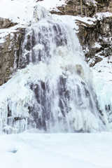 Fototapeta na wymiar Waterfall in the Alps