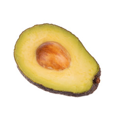 half of black avocado with stone isolated on white background