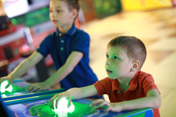 Boys playing in amusement park