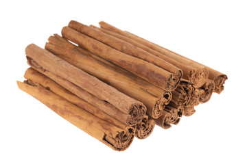 heap of cinnamon isolated on white background