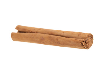 single stick of cinnamon isoalted on white background