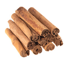 heap of cinnamon isolated on white background