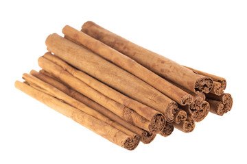 heap of cinnamon isolated on white background