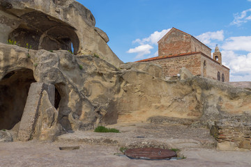 Ancient Rock-hewn town Uplistsikhe and Uplistsuli church . Georgia - 282712340