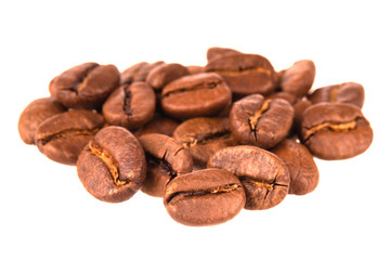 heap of coffee beans isolated on white background