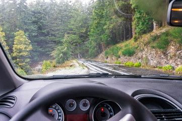 View from driver. Driving by car snowing road to Pico Ruivo, Madeira mountain