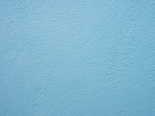 Blue painted cement wall. Abstract grunge texture background. Copy space, empty template for text