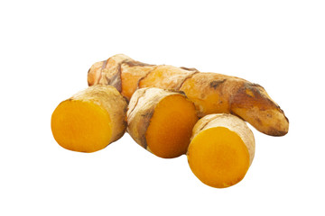 heap of turmeric slices isolated on white background