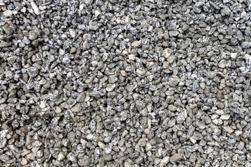 Gravel stone pile in open ground