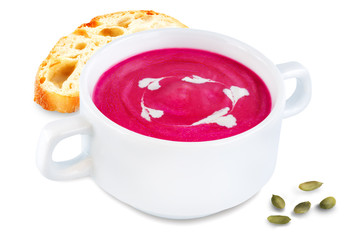 Beetroot soup in white bowl on a white isolated background