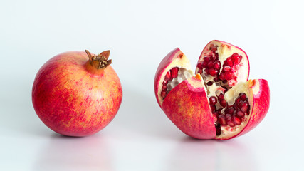 Pomegranate fruit on white background.