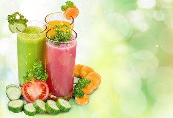 Healthy  vegetable juices on background