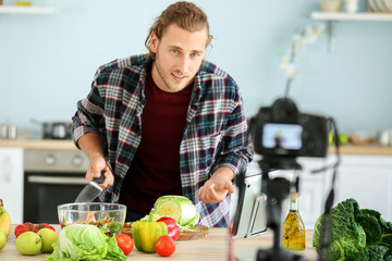 Food blogger recording video at home