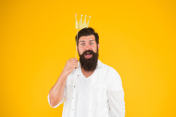 King of party. Costume party. Holiday carnival celebration. Birthday boy. Handsome bearded guy...