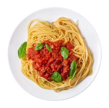 Pasta al pomodoro e basilico. Spaghetti with fresh tomato and basil, isolated on white, top view